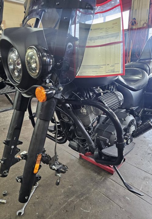 Motorcycle mechanic working on Harley in columbia sc