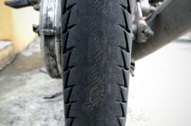 bad motorcycle tire that needs to be replaced